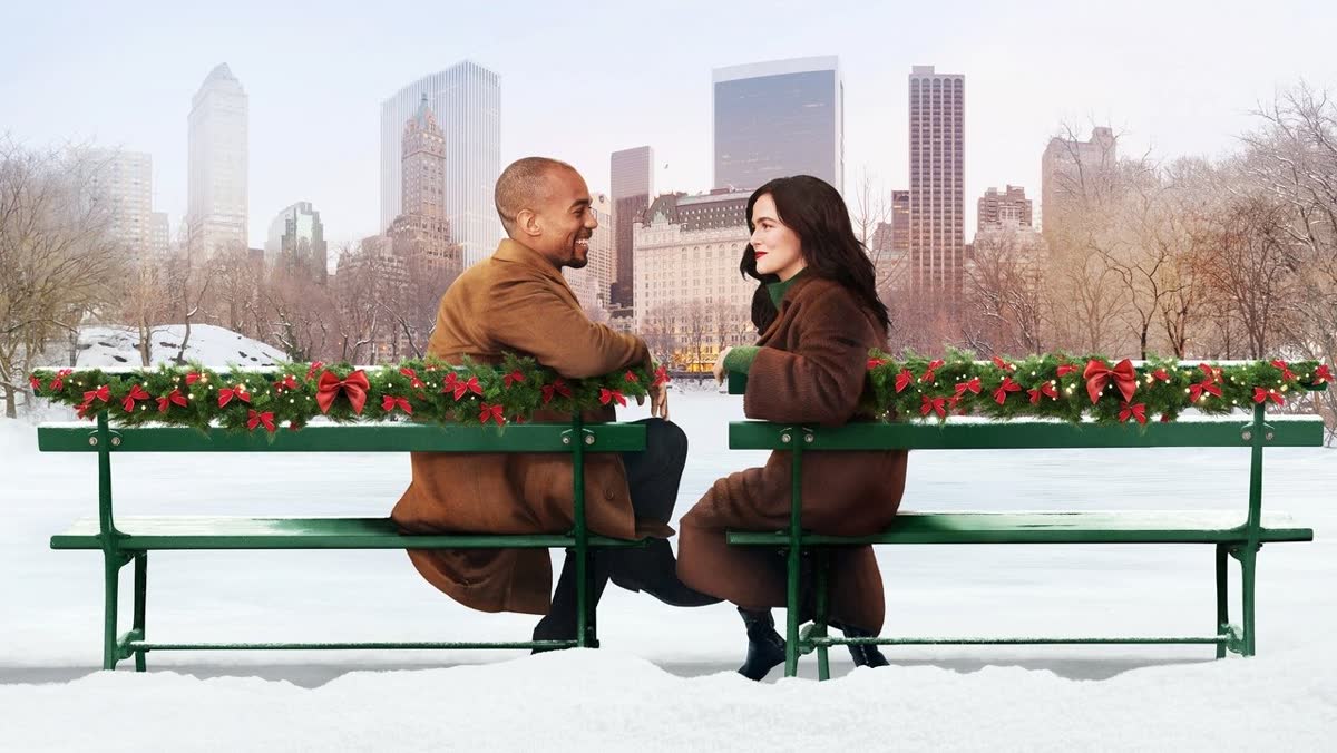 A couple talking on a snowy park bench in New York in Something from Tiffany's