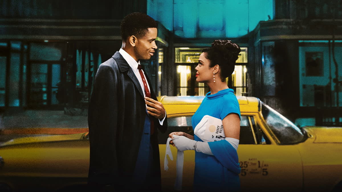 Sylvie and Robert standing by a yellow taxi in 1950s Harlem in Sylvie's Love